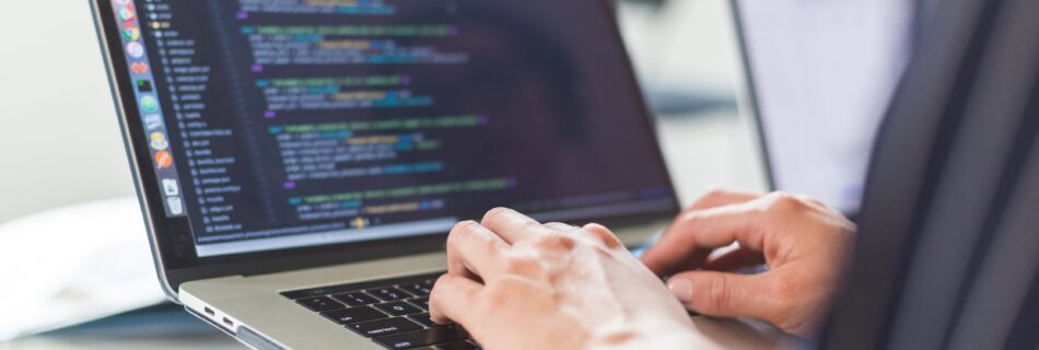 coding on laptop